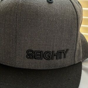 Eighty Eight Charcoal Men's trucker style Hat. Snap back (OS)